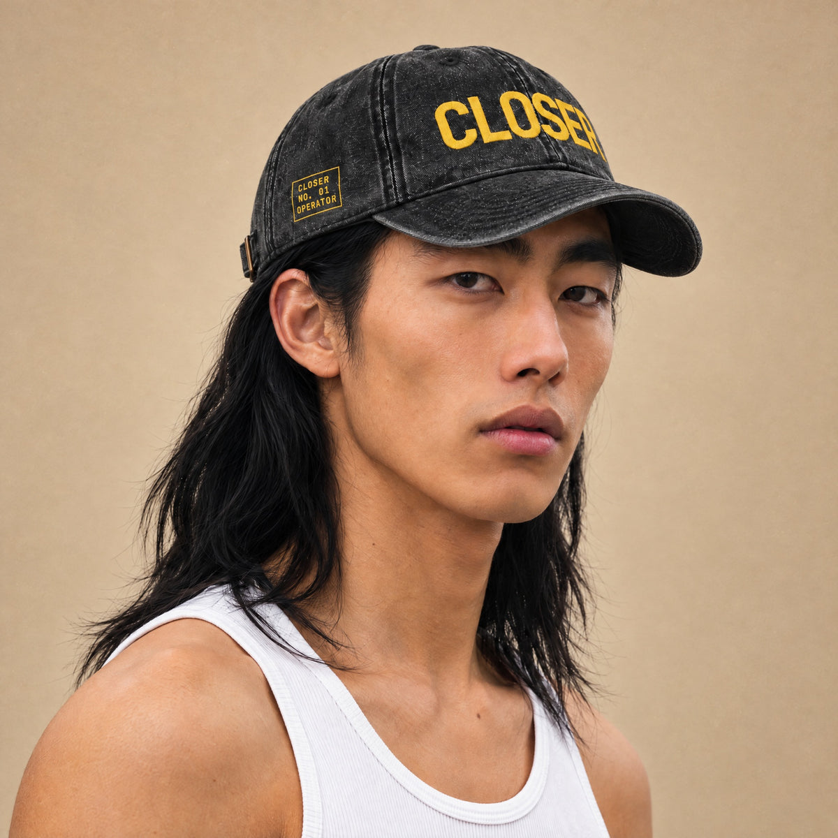 CLOSER vintage hat, yellow on black, on model