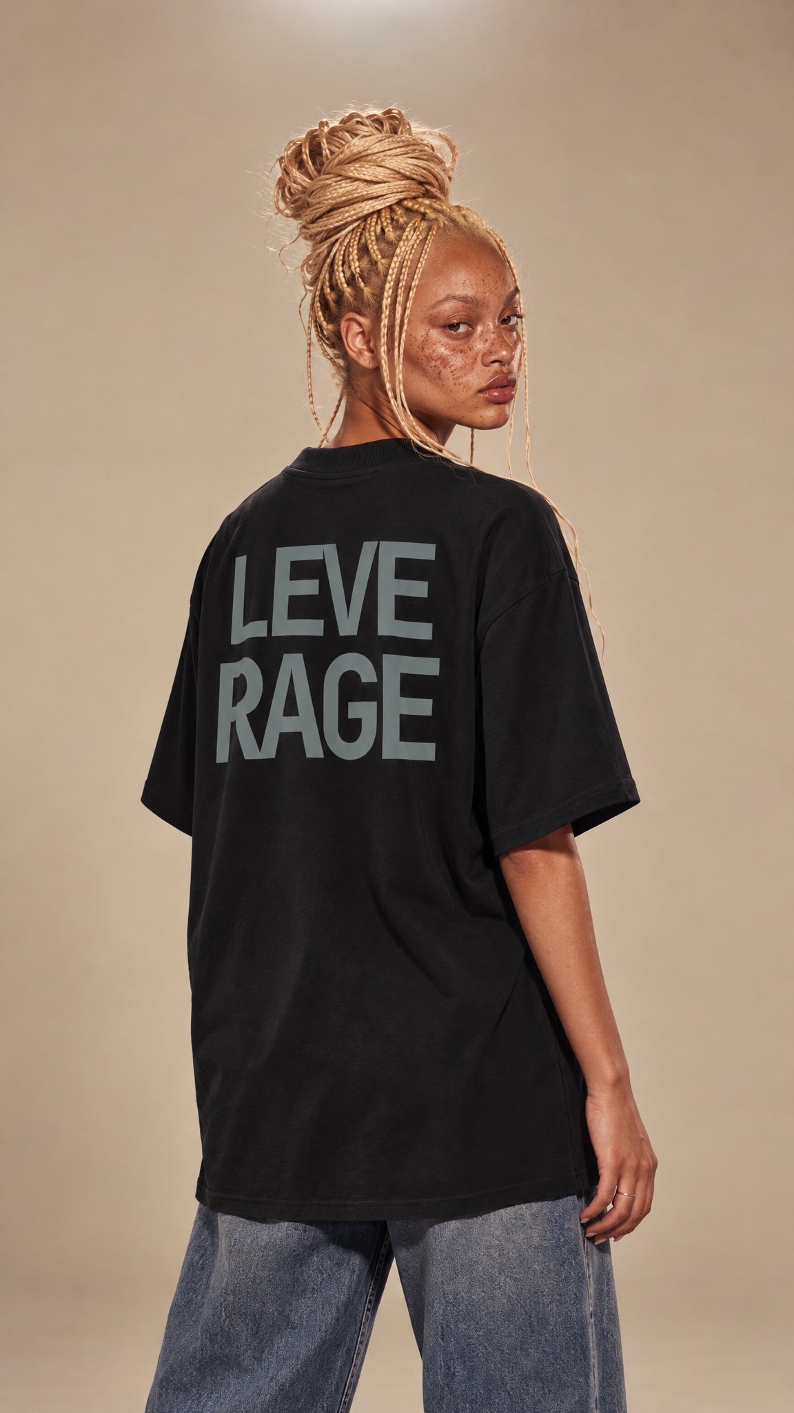 LEVERAGE black high neck tee, back, on model