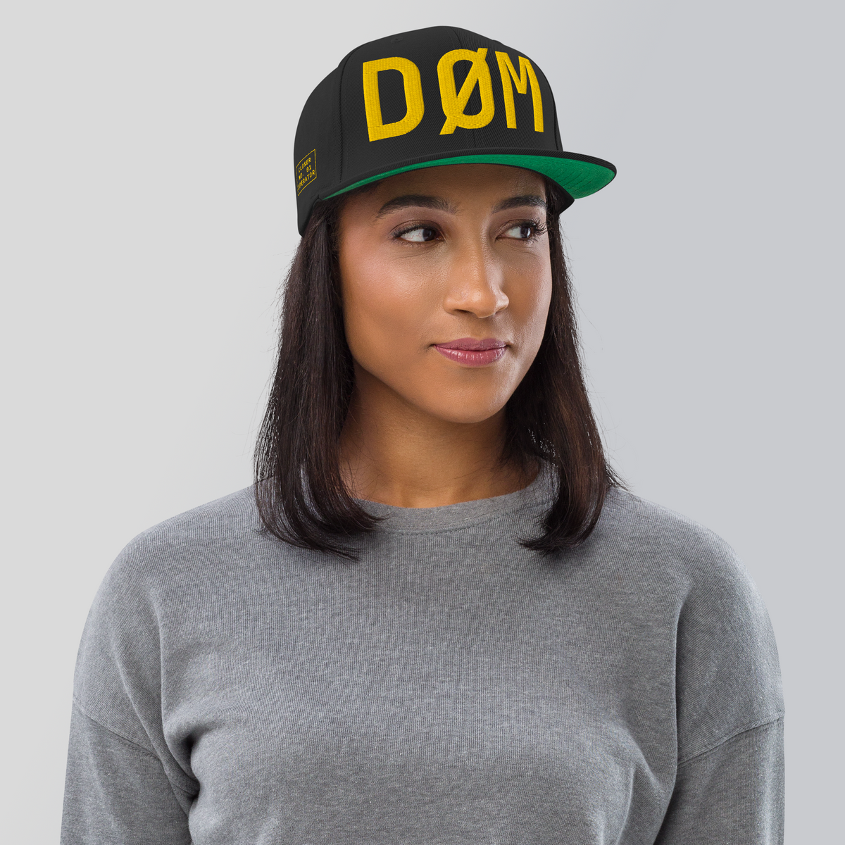 DØM snapback hat in black, yellow stitch — BLUE SICKS OPERATOR