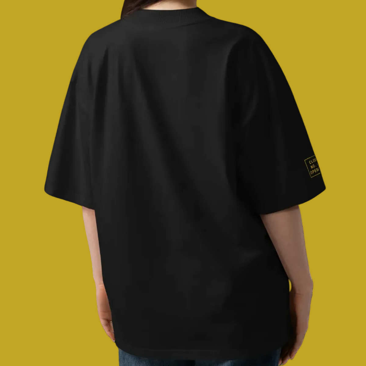 Oversized high neck t-shirt in black, back view on model — BLUE SICKS OPERATOR